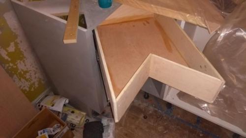 Corner drawers for a corner cupboard