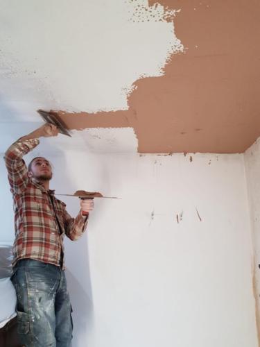 Plastering in action